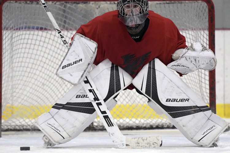 Maranacook/Winthrop/Madison/Spruce Mountain goalie Will Hays practices Tuesday at Kents Hill. Hays has statistically been the busiest goalie in Maine high school hockey each of the last two years. He faced more than 900 shots last season alone.