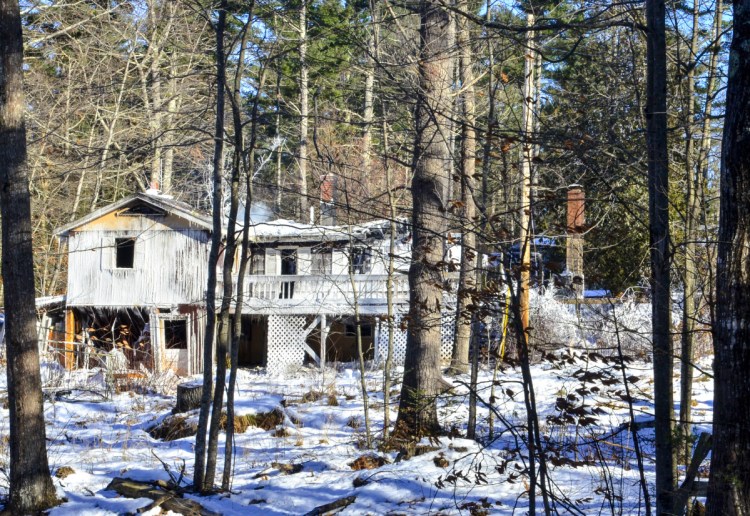 This photo taken at 10:43 a.m. on Saturday shows 358 Narrows Pond Road in Winthrop after it was heavily damaged by an overnight fire.