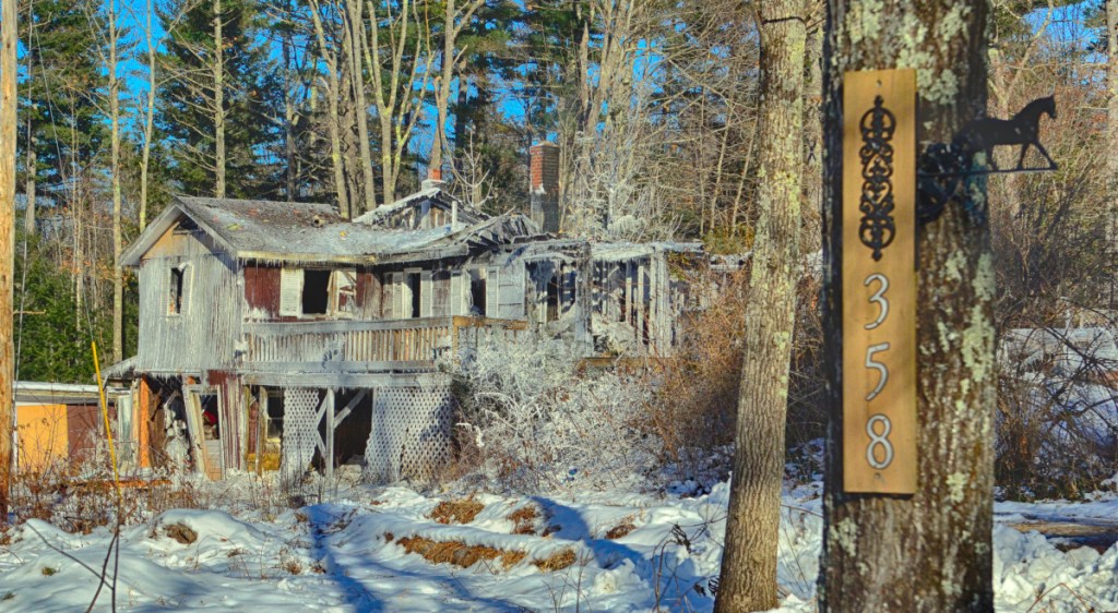This photo taken at 10:40 a.m. on Saturday shows 358 Narrows Pond Road in Winthrop after it was heavily damaged by an overnight fire.