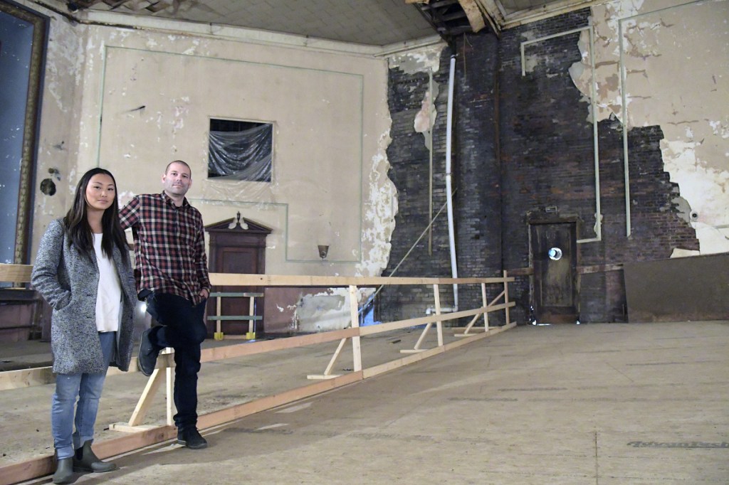 Tobias and Soo Parkhurst, whose family is the driving force behind efforts to raise $8.5 million or so to save and restore the Colonial Theater in downtown Augusta, stand in the theater on May 18, 2016.