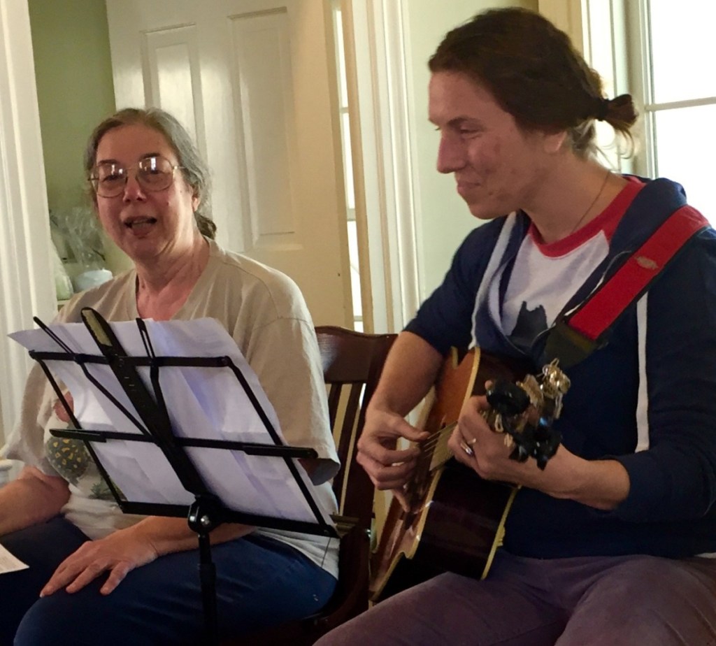 Grace Goldberg, songwriter and musician Heather Richards performing at the 2018 New Year's Day open mic and community-sing-along.