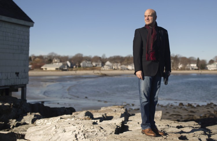 Claude Morgan, incoming South Portland mayor, poses at Willard Beach on Saturday. "I actually love serving on the council. It's the closest thing to a family experience in my life," he says.