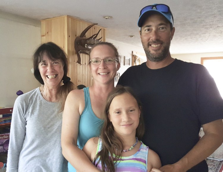 Gwen Fletcher, 10, is being cared for by her grandmother, Gail Fletcher, left, after Gwen's parents, Julie and Dylan Fletcher, died of cancer just two weeks apart.