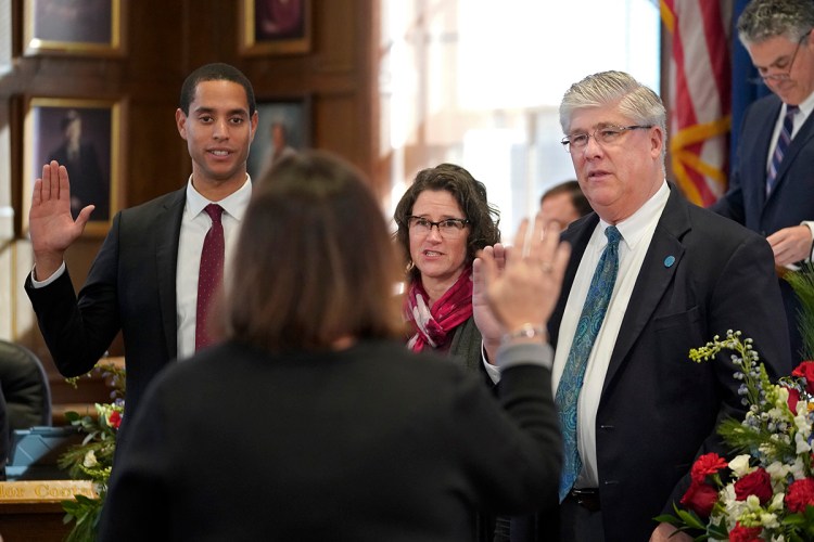 Councilors Spencer Thibodeau, Belinda Ray and Nicholas Mavodones Jr. are sworn in by City Clerk Katherine Jones on Monday at Portland City Hall. 