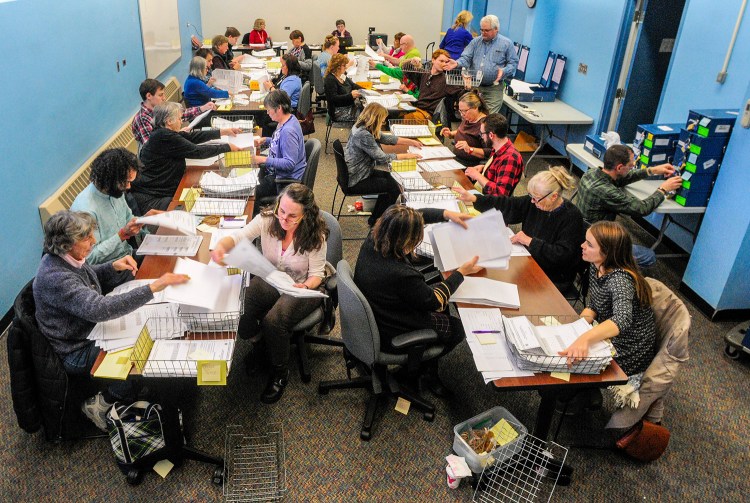 The 2nd Congressional District recount was in full swing Thursday in Augusta, a day before Rep. Bruce Poliquin called for it to end.