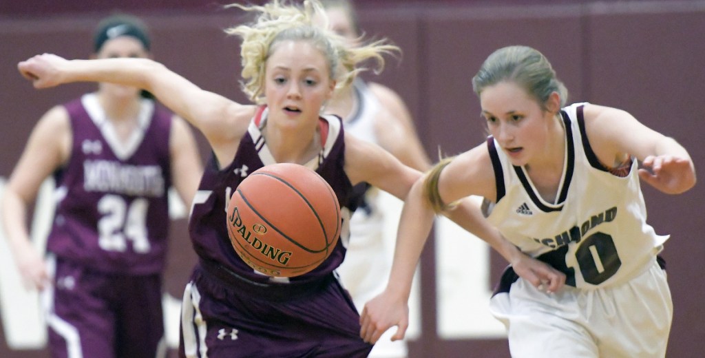 Richmond's Marybeth Sloat, right, and Monmouth's Julia Johnson chase a ball during a Mountain Valley Conference game Thursday in Richmond.