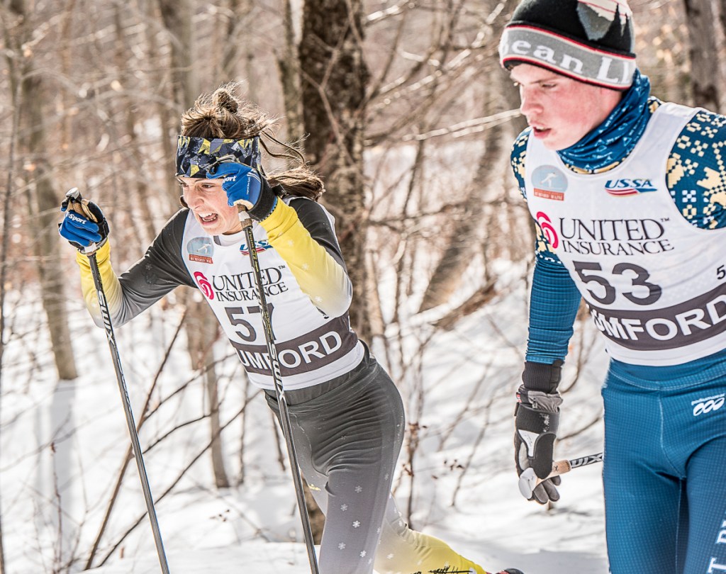 Carter McPhedran of Maranacook, left, passes Mt. Blue's Mick Gurney at the Sassi Memorial 5K classical race Saturday at Black Mountain in Rumford.