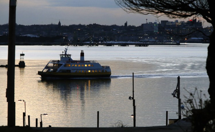 The Machigonne II ferry approaches Peaks Island on its 4:30 p.m. run from Portland recently. In the summer, when ferry ridership more than quadruples, the commute can become quite a bit more challenging. Plans to launch a much larger ferry has islanders feeling conflicted; they might have an easier time getting home to Peaks, but so will summer tourists.