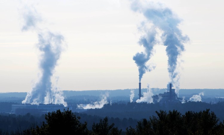 The Sappi paper mill is seen from a distance in Skowhegan on Jan. 4, 2019. On Thursday, members of Local 2740 of the International Association of Machinists voted overwhelmingly to ratify a new three-year contract.