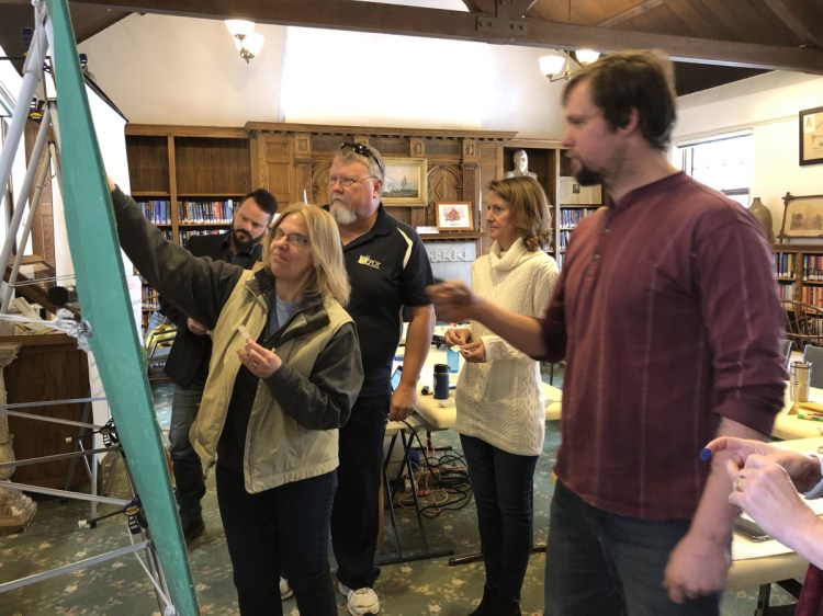 From left, Gardiner Councilors Shawn Dolley, Maryann White, Timothy Cusick, Amy Rees and Jon Ault indicate which city issues they would like to see considered priorities in 2019 as part of a goal-setting session Saturday at Gardiner Public Library. The completed list is expected to come before the City Council for ratification in March.