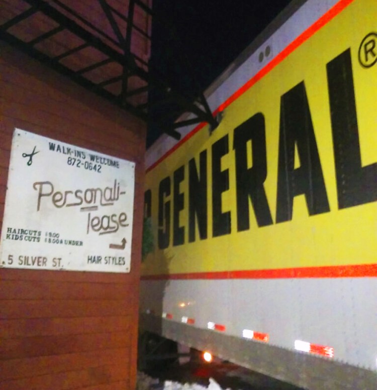 A fire escape punctured a tractor-trailer that was trying to make a delivery Saturday night to the Dollar General store in The Concourse in downtown Waterville while the truck was turning east onto Silver Street. Firefighters had to cut a piece of the truck's trailer out to free the vehicle.