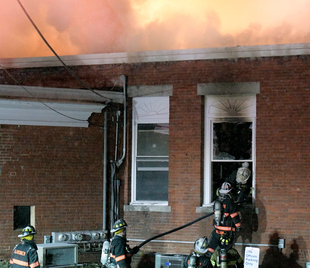 Kennebec Journal photo by Andy Molloy
Gardiner and Augusta firefighters battle a blaze in December 2018. The Gardiner City Council will discuss staffing of the department on Wednesday.