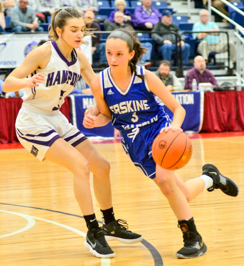 Hampden's Isabelle Soucy, left, defends Erskin's Mackenzie Roderick during a Class A North quarterfinal game Friday at the Augusta Civic Center. 