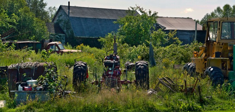 A variety of objects adorn the lawn of David Smith's residence on the Alexander Reed Road in Richmond in this Aug. 21, 2018 photo. The town has declared the property a junkyard and is planning to have it cleared of the items.