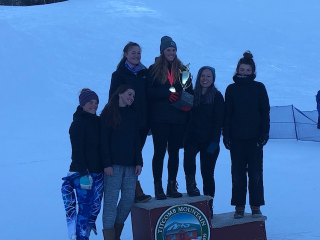 The Rangeley girls Alpine ski team celebrates its Mountain Valley Conference championship Saturday at Titcomb Mountain in Farmington. The Lakers are in their first season as a varsity program.