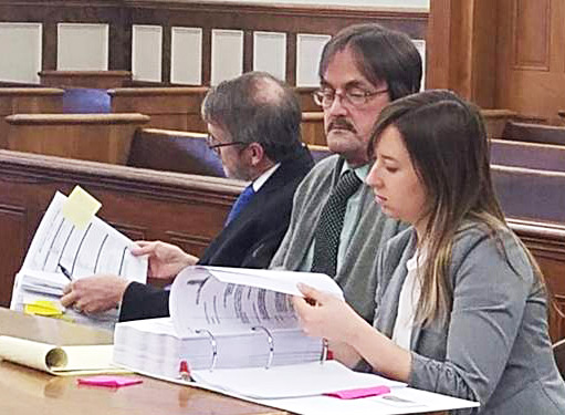 Randall Weddle, center, sits with his attorneys, Christopher MacLean Laura Shaw, in Knox County Superior Court. on Jan. 22, 2018.