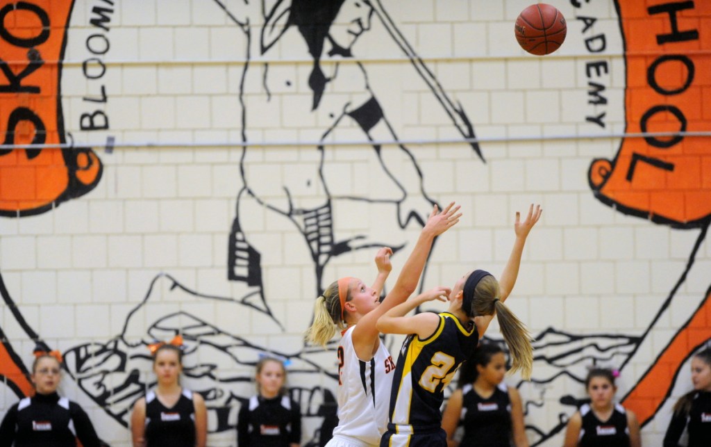 The Skowhegan Area High School Indian mascot is emblazoned on the wall of the gymnasium during a game against Mt. Blue High School in Skowhegan in December 2013.