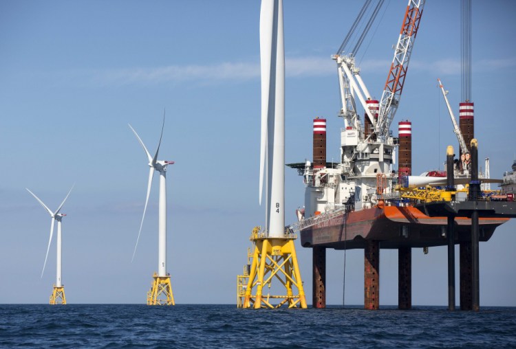 A lift boat assembles a wind turbine off Block Island, R.I. in 2016.