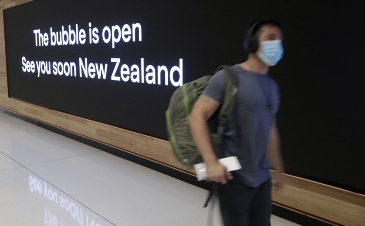 A passenger travels through Sydney Airport, in Sydney, Australia, on April 19. 

