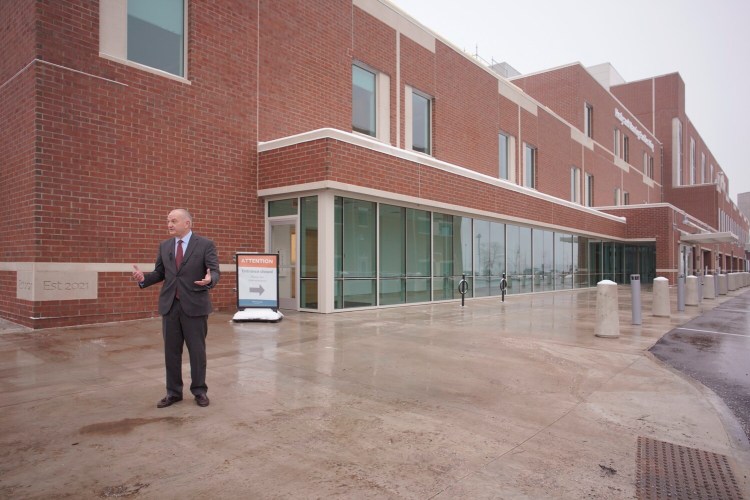 Charlie Therrien, president of Northern Light Mercy Hospital, talks to the media during a tour of the hospital’s expansion at its Fore River campus in Portland, which includes a new emergency department and more inpatient beds. The expansion is part of the hospital’s plans to consolidate services as it prepares to close its State Street facility in January.