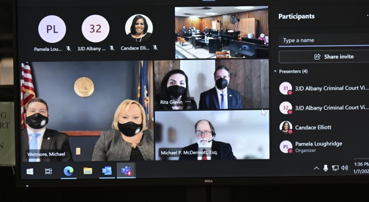 Former New York Gov. Andrew Cuomo appears virtually for a court session in Albany City Court before Judge Holly Trexler, as she granted a prosecutor's request to dismiss a fondling case against him on Friday in Albany.
