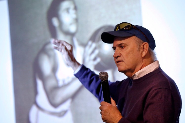 PORTLAND, ME - DECEMBER 5: Local author Phil Hoose talks about his new book "Attucks! Oscar Robertson and the Basketball Team That Awakened a City" during a presentation on Wednesday at Portland Public Library. (Staff photo by Ben McCanna/Staff Photographer)