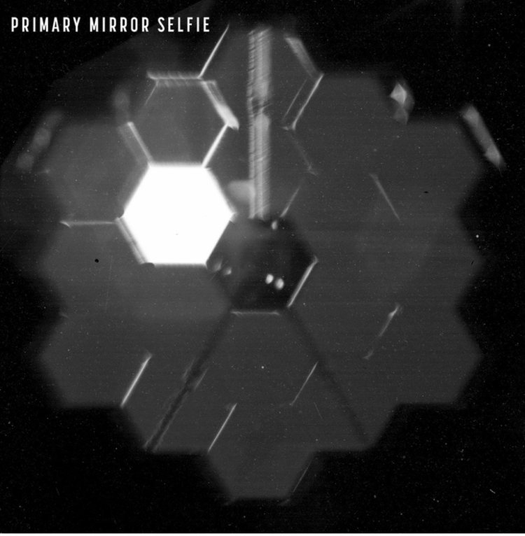 This photo provided by NASA shows a “selfie” created using a specialized pupil imaging lens inside of the NIRCam instrument that was designed to take images of the primary mirror segments instead of images of space.  