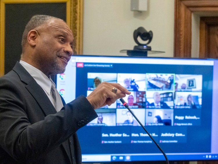 District Court Judge Rick Lawrence speaks Friday before the Judiciary Committee during his confirmation hearing to become an associate justice on the Maine Supreme Judicial Court at the Maine State House in Augusta.