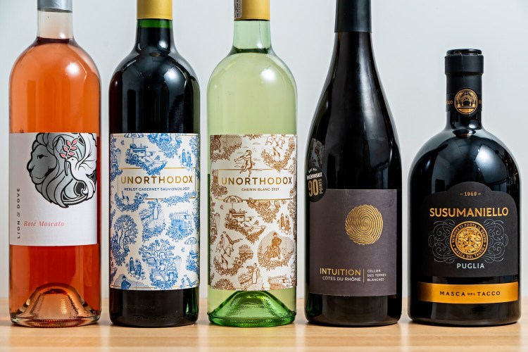 (L-r) Lion & Dove Rosé Moscato, Unorthodox Merlot Cabernet Sauvignon 2020, Unorthodox Chenin Blanc 2021, Cellier des Terres Blanches Intuition Côtes du Rhône 2019, Masca del Tacco Susumaniello 2020. MUST CREDIT: Photo for The Washington Post by Scott Suchman