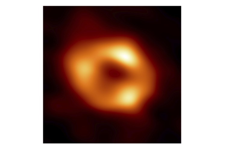 A black hole at the center of our Milky Way galaxy. The Milky Way black hole is called Sagittarius A*, near the border of Sagittarius and Scorpius constellations. It is 4 million times more massive than our sun. 