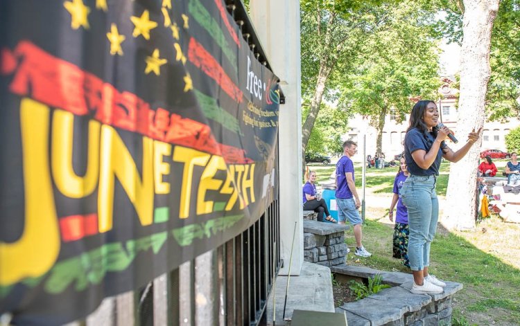 Melissa Hue, Lewiston's director of Diversity, Equity and Inclusion, urges attendees at Friday's Juneteenth celebration to vote.