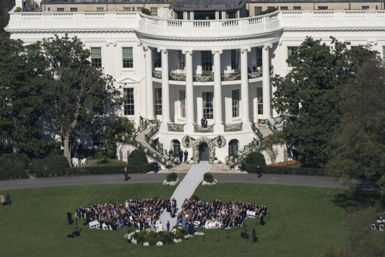 President Biden's granddaughter Naomi Biden and her fiance, Peter Neal, are married on the South Lawn of the White House on Saturday.