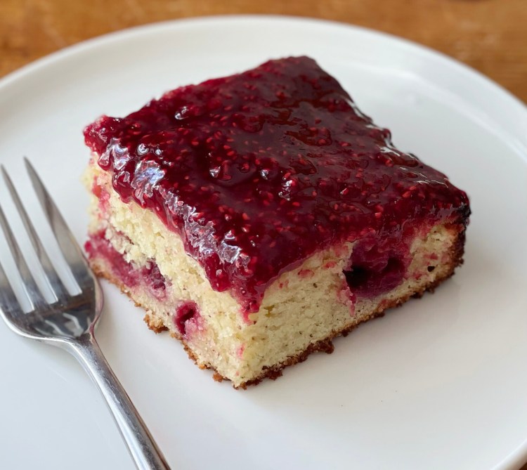 A slice of Double Sumac and Raspberry Snacking Cake.  Sumac, which is local, makes a good substitute for lemon, which is not, in some instances. 